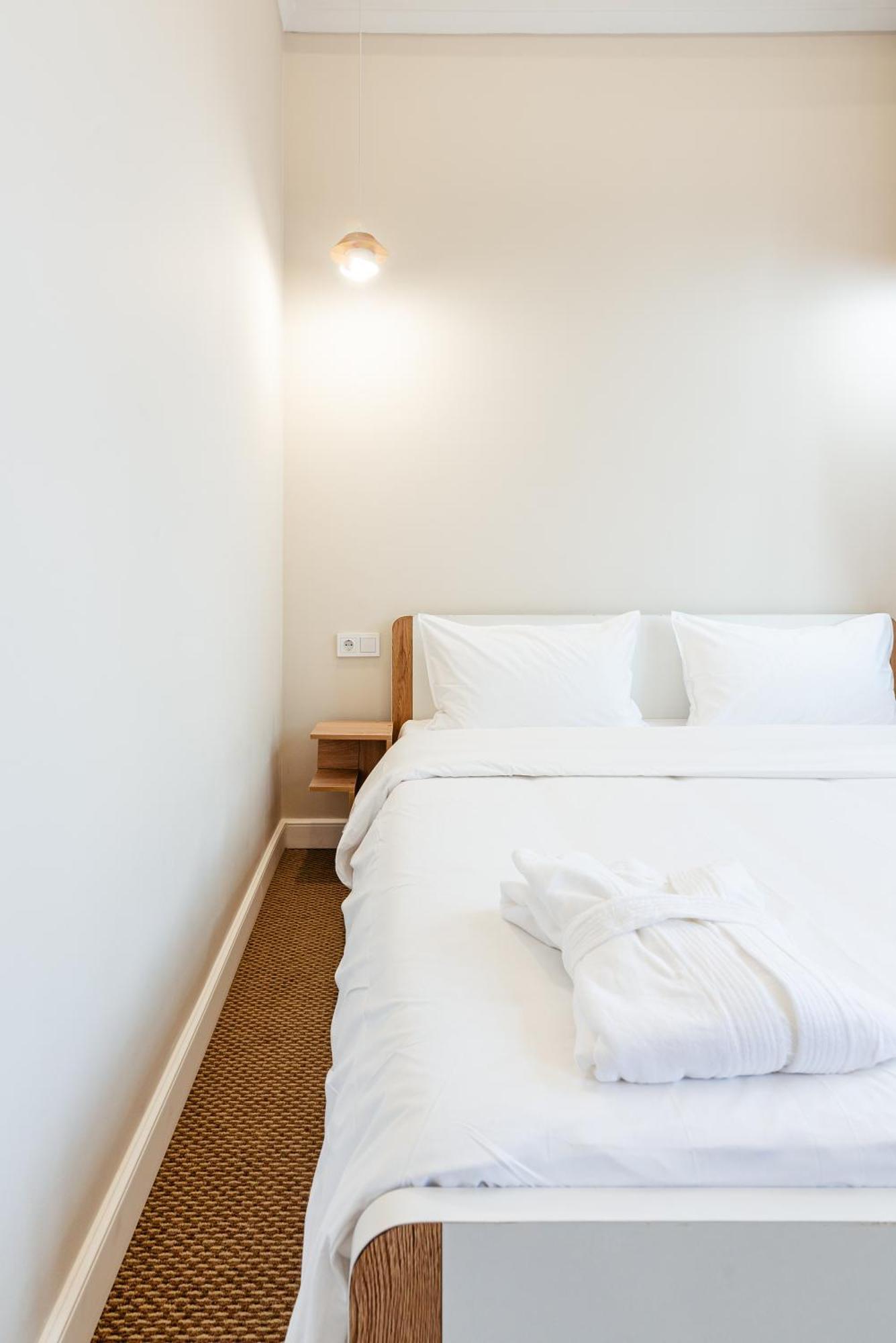 Aykun Hotel Almaty Værelse billede